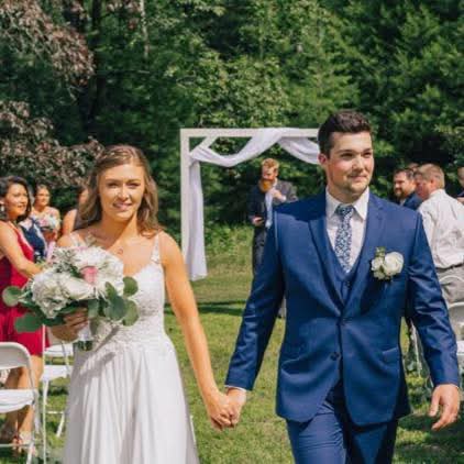 Marcus and his wife on their wedding day